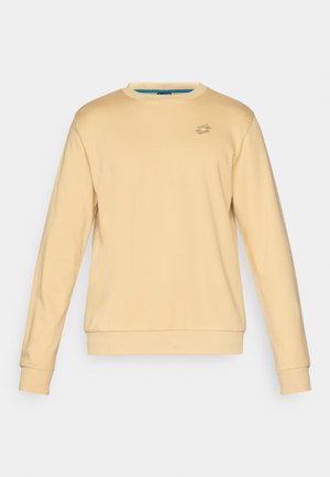 Sweatshirt amarelo claro feito de tecido suave, com mangas longas, gola redonda e um pequeno logotipo na parte superior esquerda do peito.