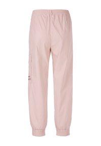 Light pink cropped pants made from smooth fabric, featuring an elastic waistband, cuffed hems, and a side pocket with printed text detail.
