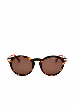 Occhiali da sole rotondi in tartaruga con lenti marroni e sottili dettagli argentati sulle aste, con le aste interne rosse visibili.