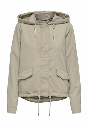 Giacca cappuccio beige chiaro con zip frontale, cordini elastici, due tasche frontali e un design leggermente accorciato. Tessuto morbido.