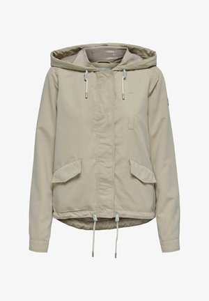 Veste à capuche beige clair avec un zip à l'avant, des cordons élastiques, deux poches avant et un design légèrement court. Texture de tissu lisse.