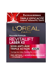 Boîte de crème anti-âge L'Oréal Revitalift Laser X3, gris foncé avec des accents dorés, avec une étiquette rouge et rose affichant les ingrédients et les avantages.