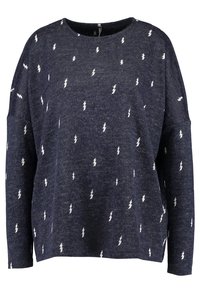 Pull-over marine en tissu doux avec une coupe décontractée. Présente des motifs d'éclairs blancs sur toute sa surface et un col rond classique.