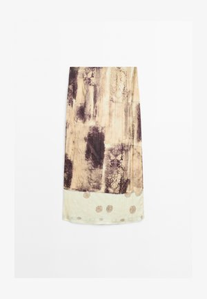 Lichtgewicht stoffen rok met een beige basis en abstracte donkerpaarse prints en cirkelvormige gouden accenten aan de zoom.