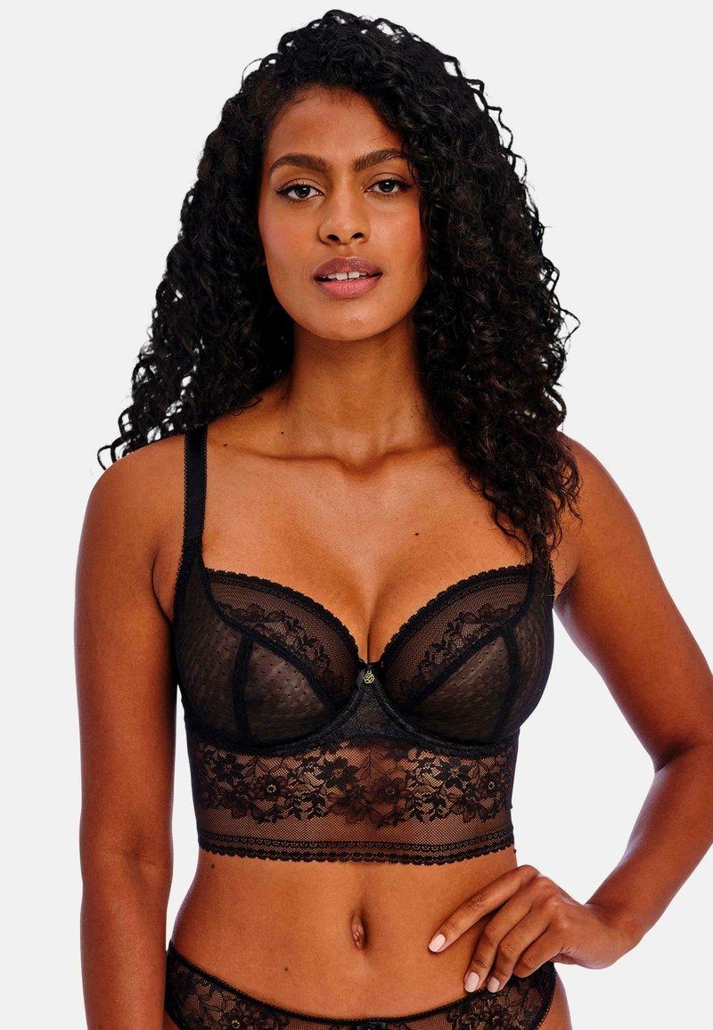 Black lace bralette featuring a dotted mesh design, underwire support, and floral lace trim. Thin straps and a decorative center accent.