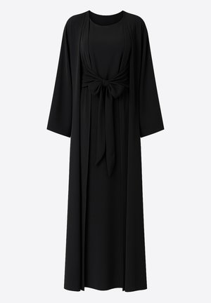 Vestido negro con un diseño fluido, mangas largas y un detalle de lazo frontal. Fabricado con tela suave, con un escote y silueta modestos.