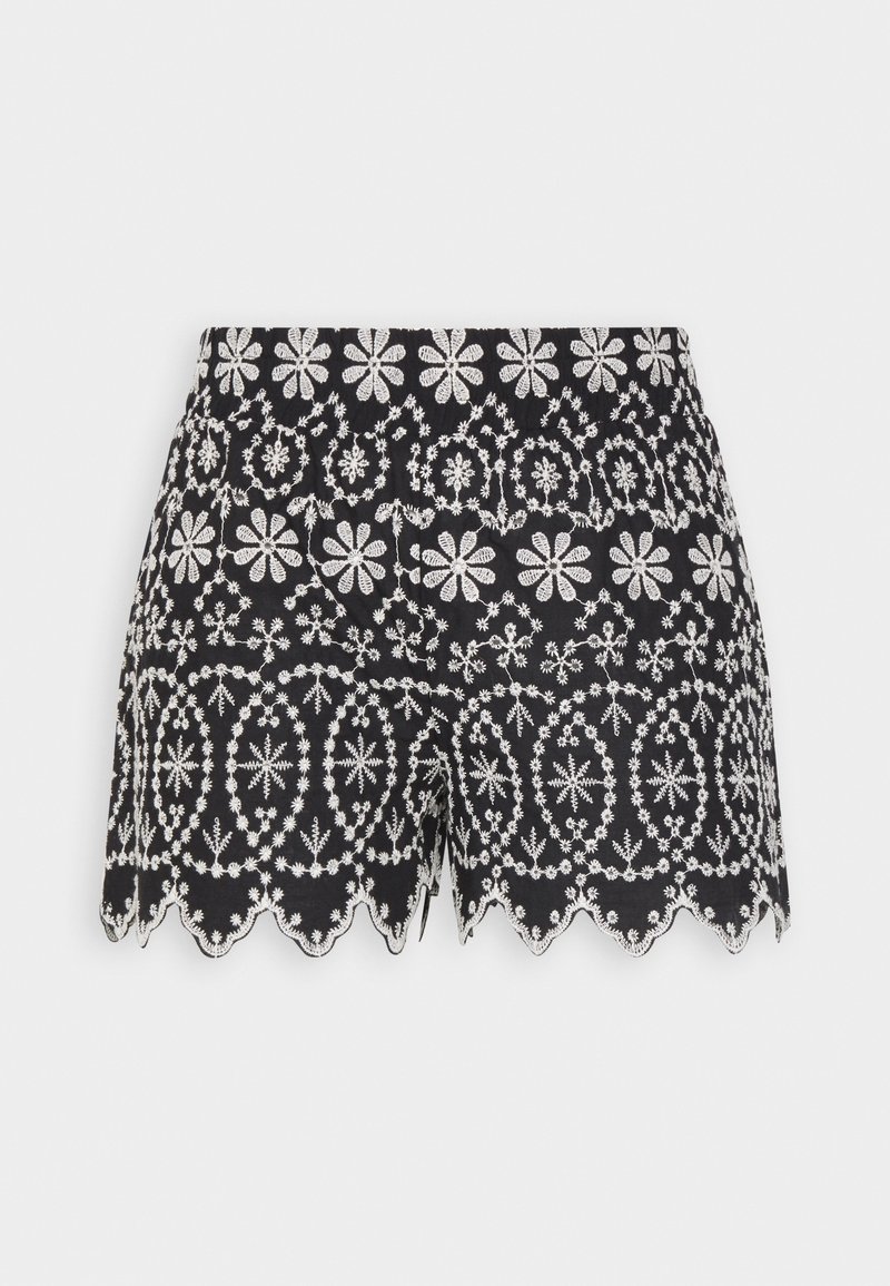 Zwarte shorts met witte bloemenborduring en een scalloped zoomafwerking.
