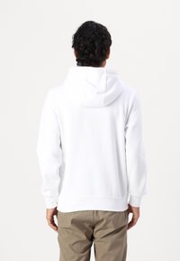 Tommy Hilfiger CENTRAL CHEST STRIPE HOODY UNISEX - Sudadera - white