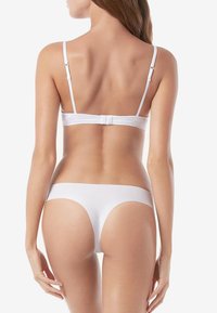 Intimissimi BRAZILIAN MIT OFFENKANTIGEM SAUM. - String - white
