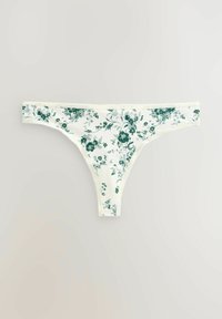 Valged lilledega stringid roheliste mustritega. Sile ja veniv kangas, mille äärtel on pitsist viimistlus. Minimalistlik disain, keskmise kõrgusega vöökoht.
