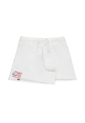 Gonna bianca asimmetrica con vita elasticizzata, coulisse, tasche laterali e una piccola toppa consumata con la bandiera americana vicino all'orlo.