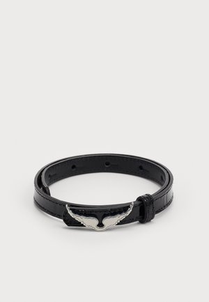 Black leather bracelet with a glossy finish, featuring a silver wing-shaped clasp. Adjustable with holes for size customization.