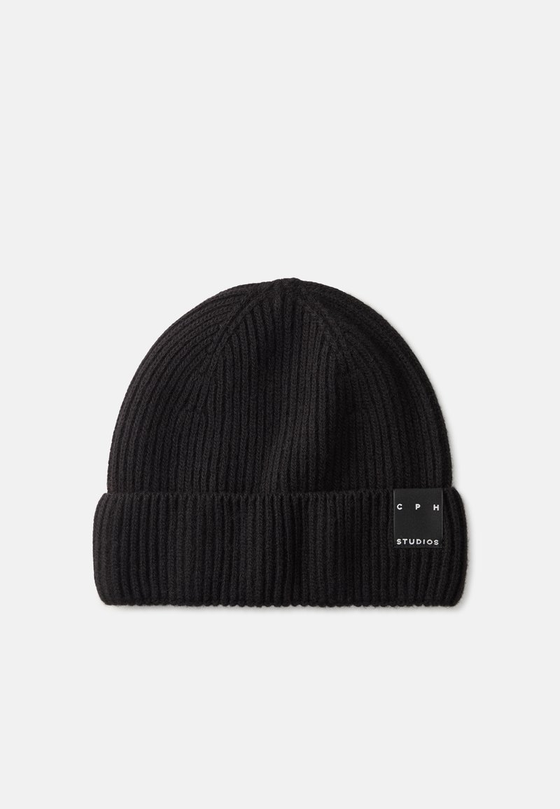 Black knit beanie with ribbed texture and a folded cuff, featuring a small branded tag on the side. Soft wool blend material.
