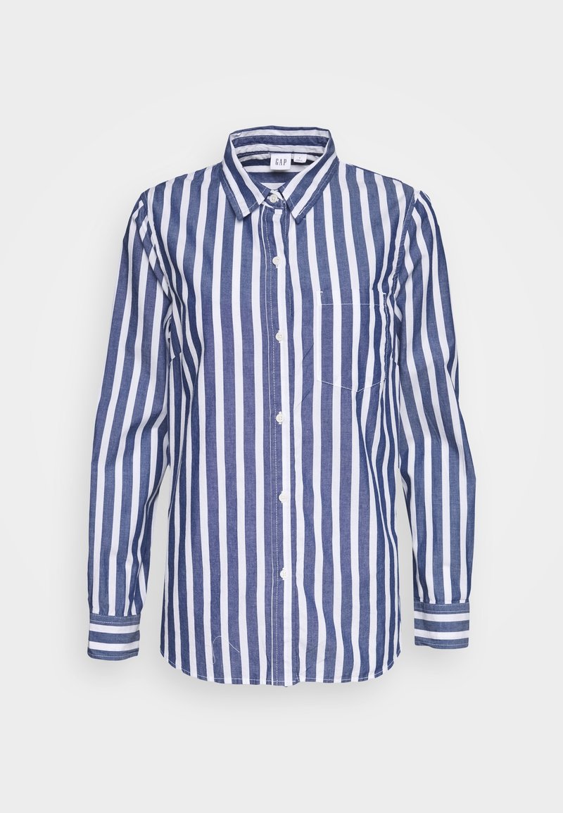 Chemise à boutons rayée avec des rayures verticales alternées bleu marine et blanches, manches longues, col et poche poitrine. Fabriquée en coton.