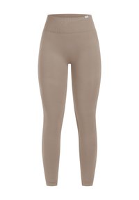 Beige hoge taille leggings gemaakt van rekbare stof, met een gladde textuur en een strakke pasvorm, zonder zichtbare naden of patronen.