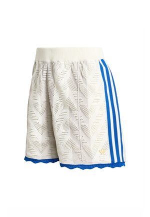 Hvide teksturerede shorts med blå sidelister, ribbet taljebånd, bølget blå kant og lille gyldent logo på den nederste side.
