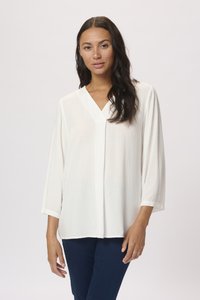 Witte blouse met V-hals, driekwart mouwen en een gestructureerd stippenpatroon, gemaakt van lichtgewicht stof.