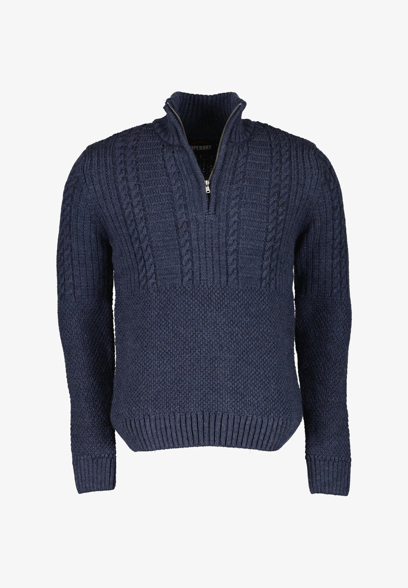 Pull en maille bleu marine avec col à fermeture éclair partielle, présentant des motifs texturés ainsi que des poignets et un bord-côte côtelés. Tissu épais et chaud.