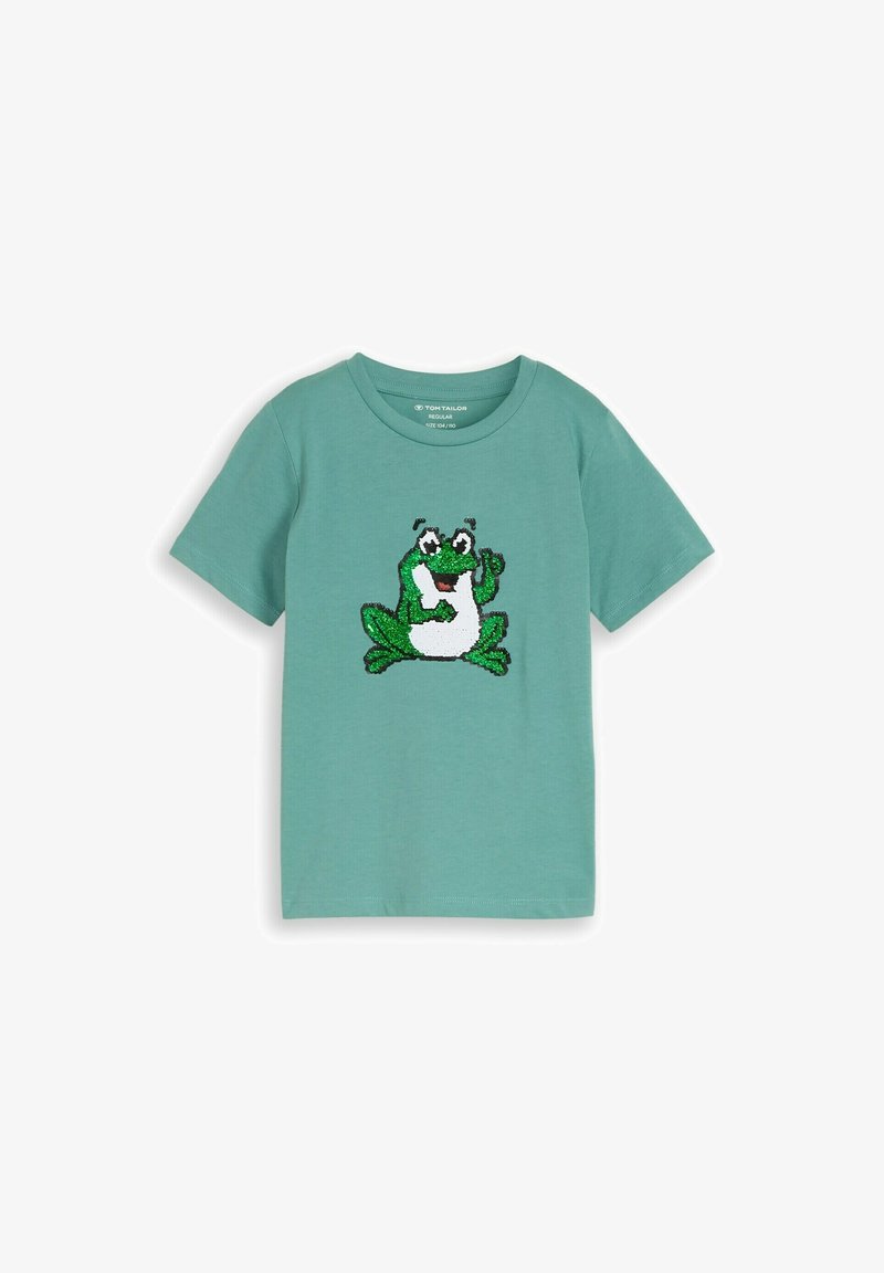 Zöld rövid ujjú gyerekpóló, elöl mosolygó béka grafikával, flitterekből.