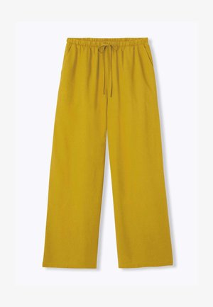 Pantalon large jaune moutarde avec taille élastique et cordon, poches avant, coupe décontractée.