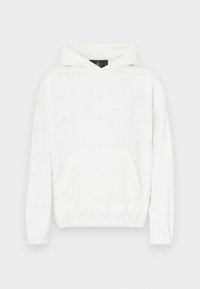 Sweat à capuche blanc avec une texture douce, doté d'une poche frontale et d'un motif discrètement en relief composé de texte sur le tissu.