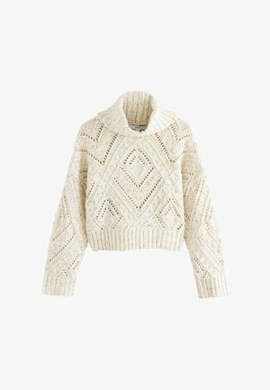 Maglione accorciato color crema con un alto colletto a coste. Presenta un intricato motivo a merletto a rombi e polsini e orlo a coste.