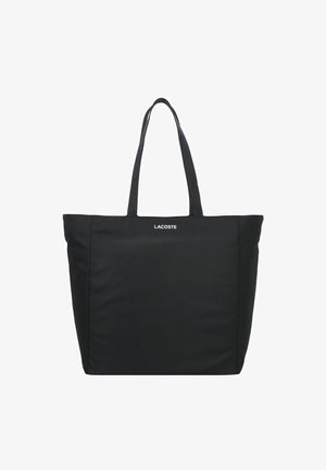 Borsa tote nera in nylon con due manici lunghi, caratterizzata da una forma rettangolare semplice e un logo sul davanti. Nessun motivo visibile.