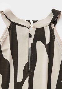 Sleeveless beige and dark brown dress with abstract pattern, featuring a split neckline and two small white buttons at the collar.