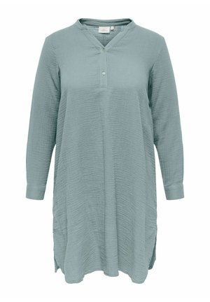 Világoskék, hosszú ujjú tunika texturált anyagból, V-nyakú, két gombos elülső résszel és az alján oldalsó hasítékokkal.