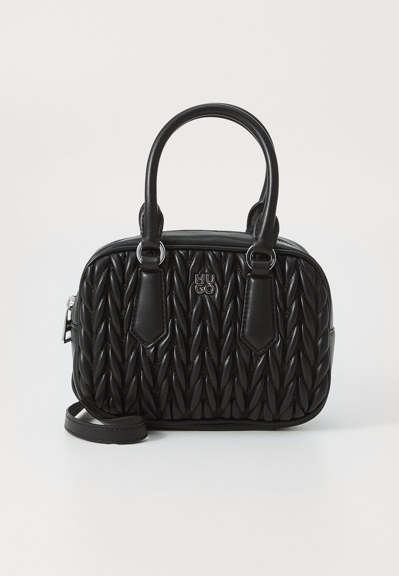 Black handbag made of quilted leather with a rounded shape, dual top handles, and a detachable strap. Features logo detail on the front.