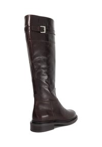 Brown leather knee-high boot featuring a rounded toe, sleek design, simple silver buckle detail, and a low stacked heel.