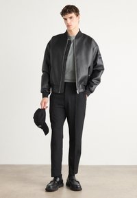Calvin Klein PULL ON - Trousers - black
