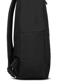 Black fabric backpack side view showing adjustable strap and smooth, padded back panel against white background.