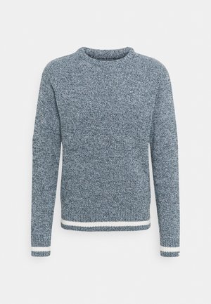 Pitkähihainen neulepusero, jossa pyöreä pääntie, sinivalkoinen meleerattu kuvio ja valkoiset raidat hihansuissa ja helmassa.