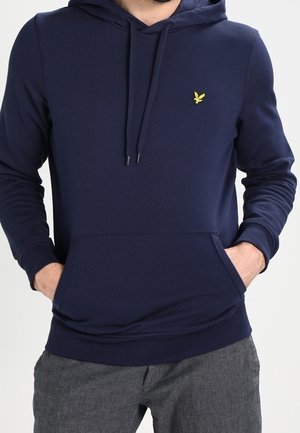Felpa blu navy realizzata in misto cotone, con tasca frontale e un piccolo logo giallo sul petto. Tessuto morbido e coulisse regolabile.