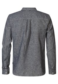 Chemise à manches longues boutonnée en tissu texturé à rayures bleu et blanc. Comprend un col classique et des poignets à boutons.