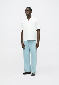 Lacoste Košeľa - flour