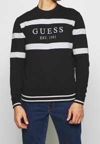 Guess Felpa - black