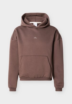 Pruun Nike kapuutsiga pusa, eesmine kängurutasku, soonilised mansetid ja alläär ning väike valge logo rinnal.