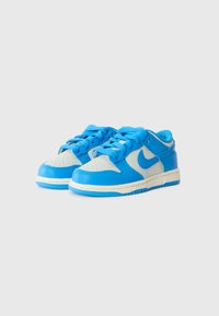 Blue and light blue leather sneakers with perforated toe, contrasting textured accents, flat laces, and a rubber sole.