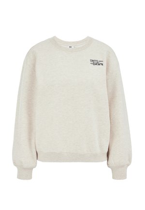 Beige sweater met ronde hals, geribbelde zoom en manchetten, met een klein zwart "Until Dawn" logo op de borst. Zachte, gestructureerde stof.