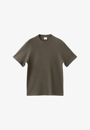 Khaki zielona koszulka z krótkim rękawem, wykonana z miękkiej bawełny. Posiada okrągły dekolt, prosty krój i teksturowane wykończenie. Brak widocznych wzorów lub akcentów.