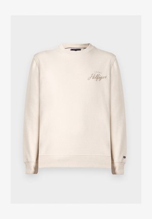 Sweatshirt crem cu guler rotund, cu manșete și tiv cu elastic, având un logo brodat subtil "Tommy Hilfiger" pe față. Textură moale.