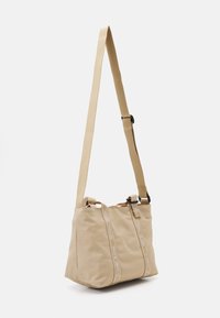 Tommy Jeans DAILY MINI  - Torba za nakupovanje - gentle gold-coloured