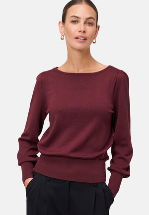 Bordeaux langarm pullover trui met een brede halslijn, geribbelde manchetten en een aangesloten tailleband. Zachte, gladde textuur en een relaxte pasvorm.