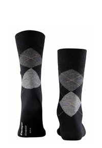 Calcetines argyle negros con patrones de rombos grises y acentos dorados. Hechos de un textil suave, diseñados para la comodidad y la durabilidad.