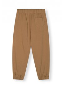 Bruine katoenen joggers met een elastische tailleband, gathered cuffs en een enkele achterzak. Zachte textuur met een relaxte pasvorm.