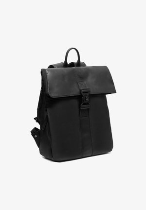 Black leather backpack with a fold-over flap, adjustable straps, top handle, and a side zip pocket. Features a magnetic snap closure.