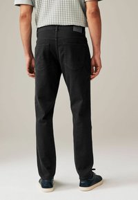 Next SUMMERWEIGHT COTTON - Jeans Tapered Fit - black