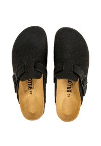 Sabots en feutre noir avec une semelle intérieure en cuir naturel, dotés de deux sangles réglables et d'un design simple. Taille 42, fabriqués en Espagne.